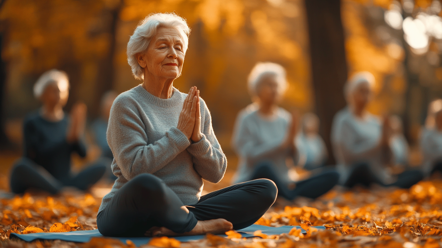 Група старших людей практикує йогу